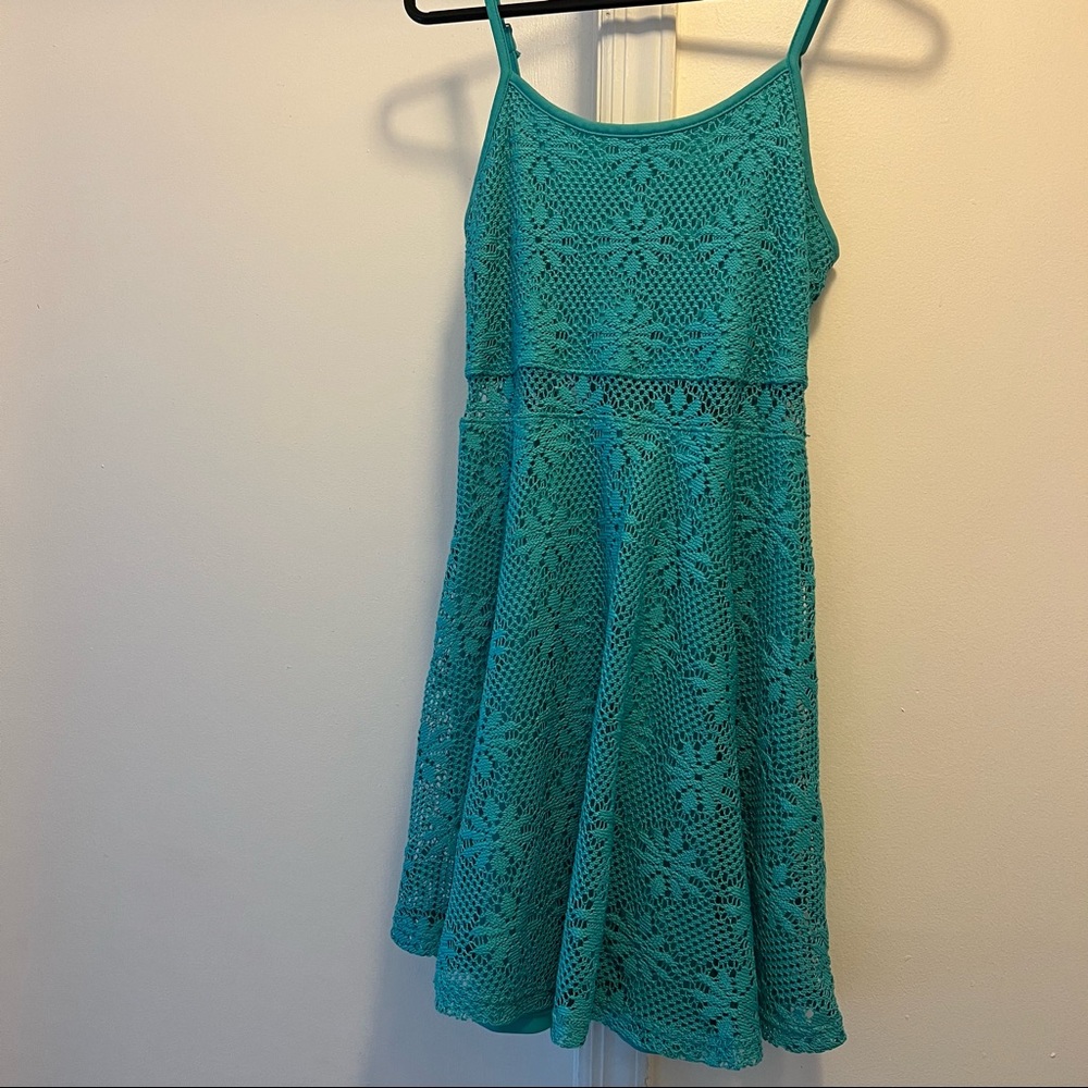 Bright green crocheted mini dress
